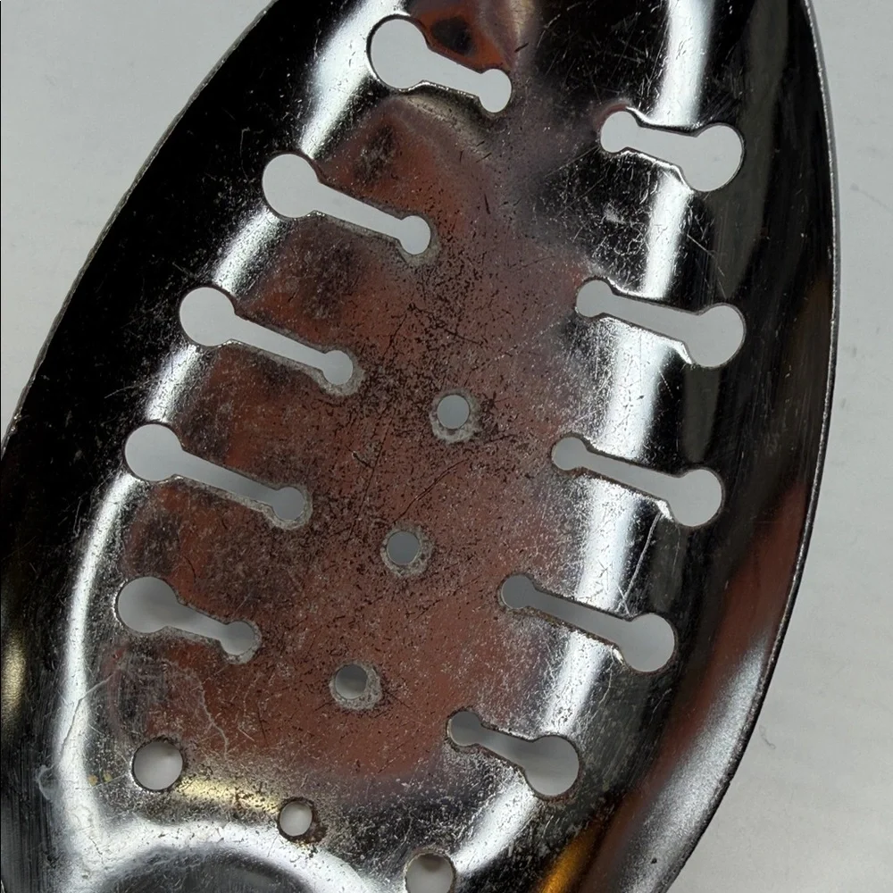 Vintage EKCO Chromium Plated Slotted Spoon with Cream Handle